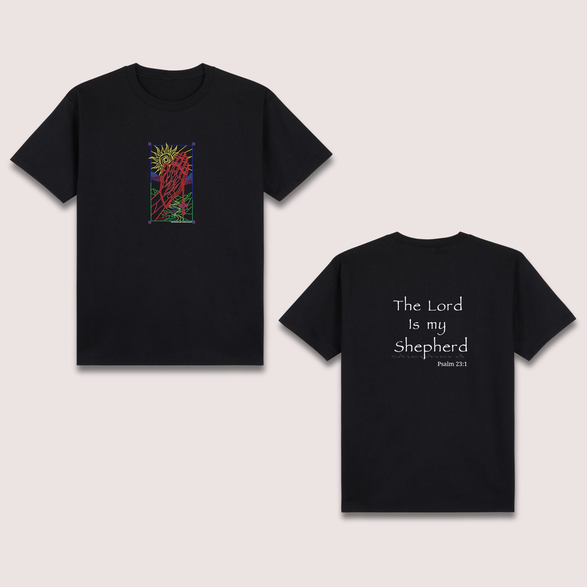 Basic T-Shirt Premium 100% COTTON 200 GSM 
Front and back view of a black streetwear tee. Front: 5x8 RGBY line art of praying hands with a cross, sun, and water elements in vibrant Red, Green, Blue, and Yellow. Back: 8x8 white text reading "The Lord Is my Shepherd" with "Psalm 23:1" below it. Only @ Tintahan-on-Thread